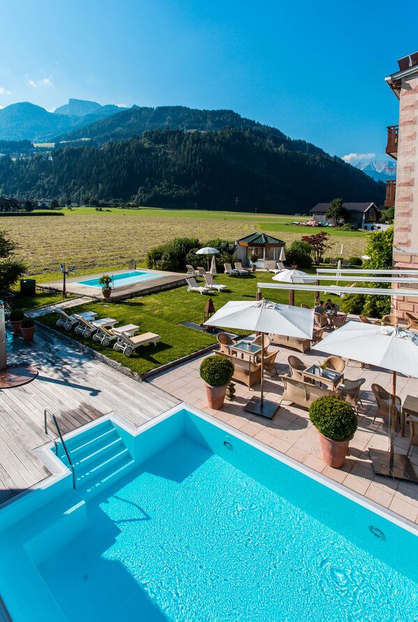 Außenansicht Garten | Wellnesshotel Theresa, Tirol