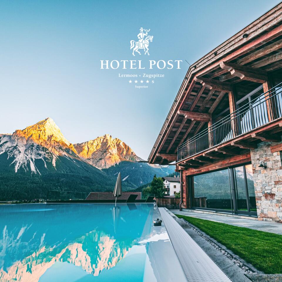Hotel Post Lermoos mit Pool und Bergpanorama im Hintergrund